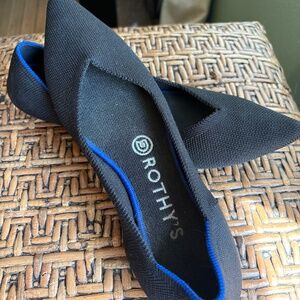 Rothy’s black with blue. Women’s Size 7.